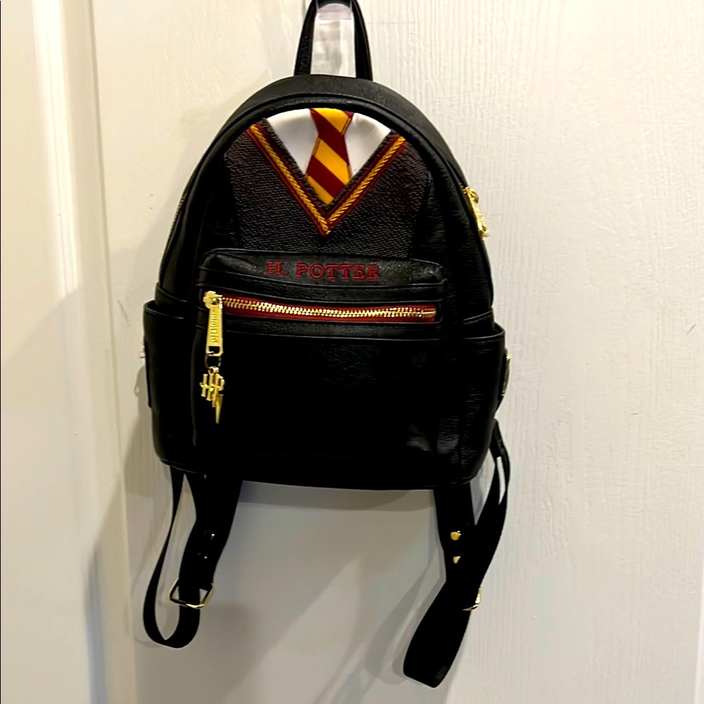 RARE Loungefly Gryffindor Uniform Backpack- retired bag, fan favorite!